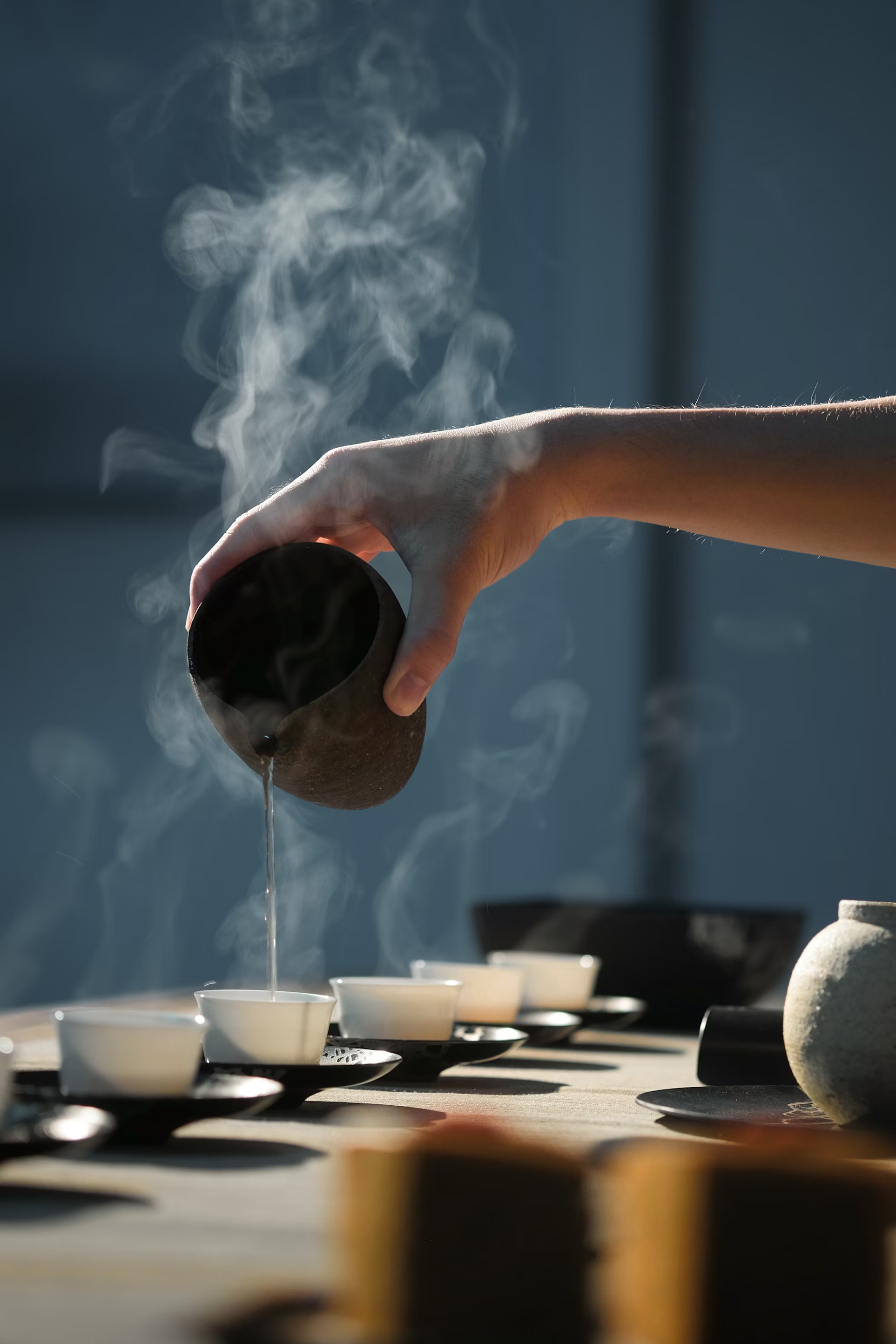 A Cha1004 drink being poured into a cup